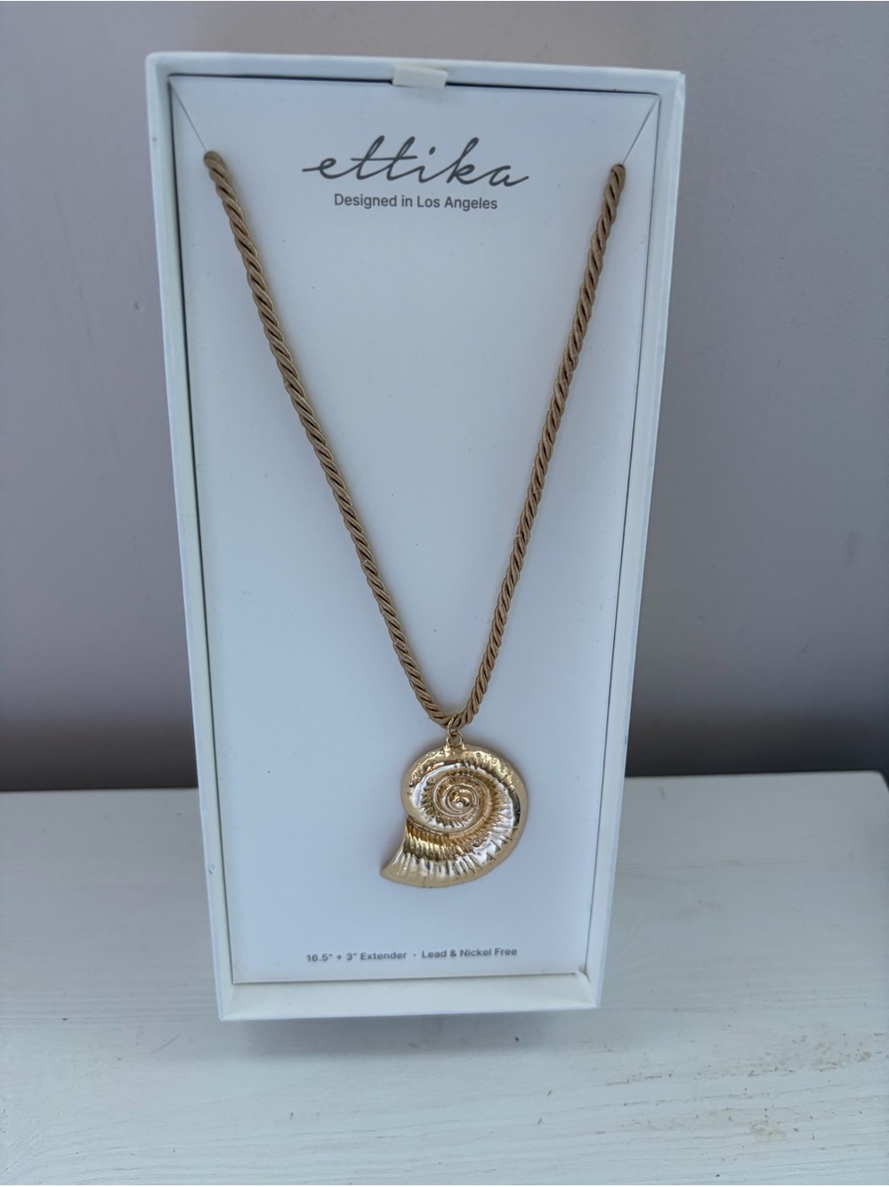 ettika Gold Nautilus Shell Pendant on Twisted Rope Chain